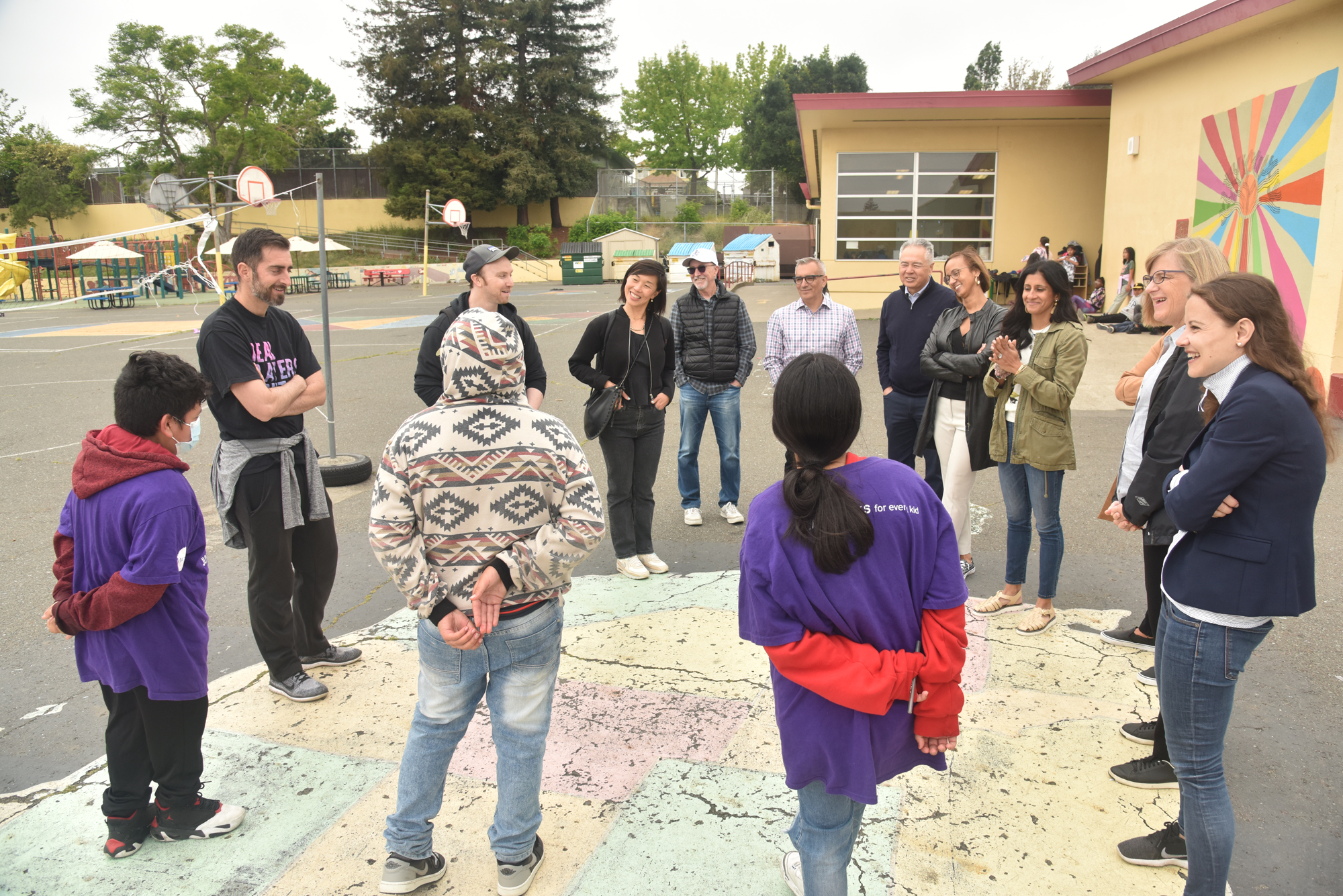 group of adults and students