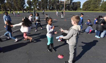 students playing on blacktop