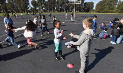 kids playing on blacktop