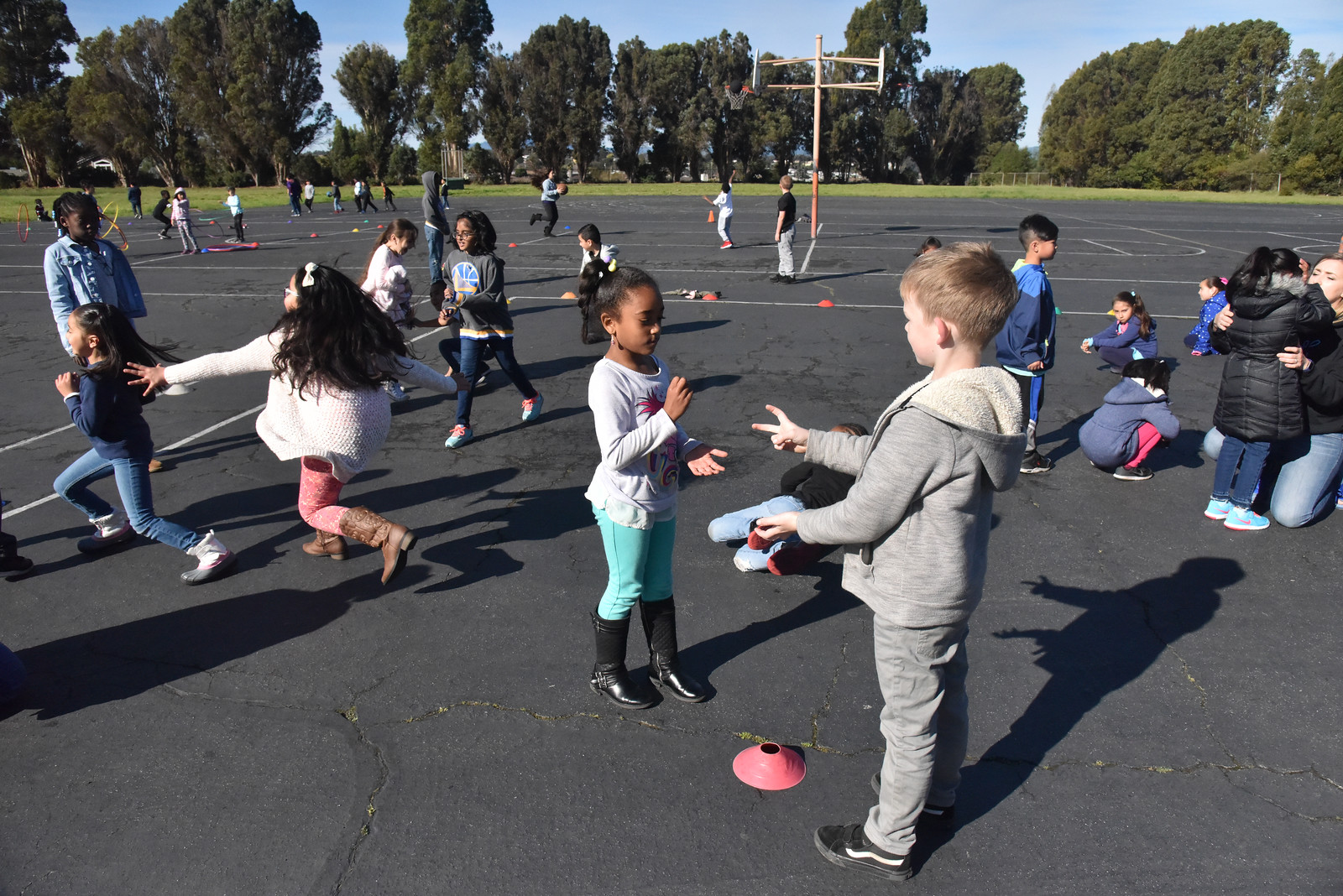 kids playing on blacktop