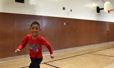 kid running in gym