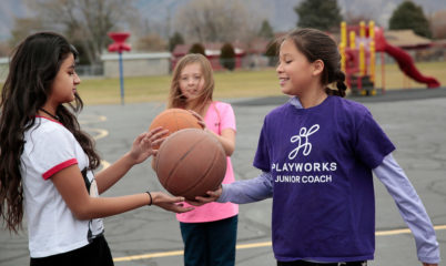 kids playing with basketballs